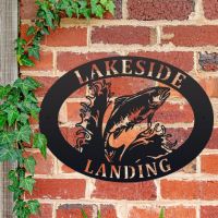 Freshwater Salmon Iron Oval House Sign on a Brick Wall Freshwater Salmon Iron Oval House Sign on a Brick Wall