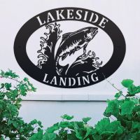 Freshwater Salmon Iron Oval House Sign on a White Wall Freshwater Salmon Iron Oval House Sign on a White Wall