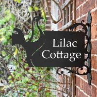 Contemporary Cockerel Iron Bracket House Name Sign in Situ on a Brick Wall Contemporary Cockerel Iron Bracket House Name Sign in Situ on a Brick Wall