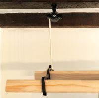 Cast iron & wood clothes airer suspended from pulleys Cast iron & wood clothes airer suspended from pulleys