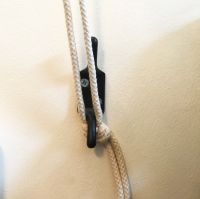 Wwall hook to secure cord Wwall hook to secure cord