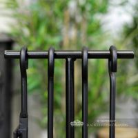 Close-up of the Tools Hooked onto the Companion Set Base