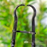 Close-up of the End of the Tongs