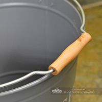 Contemporary Ash Bucket with Matching Lid - Handle Close Up Contemporary Ash Bucket with Matching Lid - Handle Close Up
