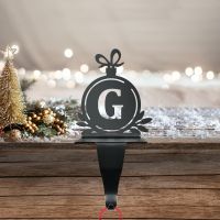 Letter G Stocking Holder in Situ on a Mantel Piece 