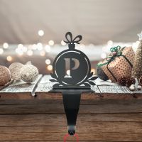 Letter P Stocking Holder in Situ on a Mantel Piece 