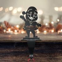 Santa Stocking Holder in Situ on a Mantel Piece Santa Stocking Holder in Situ on a Mantel Piece