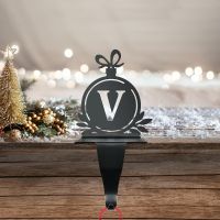 Letter V Stocking Holder in Situ on a Mantel Piece  Letter V Stocking Holder in Situ on a Mantel Piece