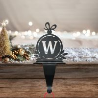 Letter W Stocking Holder in Situ on a Mantel Piece 