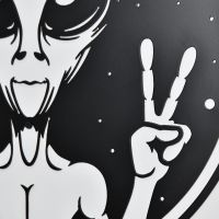 Close-up of the Peace Sign Alien Wall Art