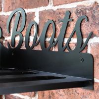 The Wording Boots on the Top of the Boot Holder The Wording Boots on the Top of the Boot Holder