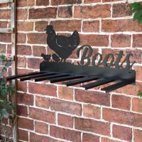 Wall Mounted Hen & Chicks Iron Boot Holder Mounted on a Brick Wall