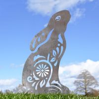 Unfinished Sheet Steel Silhouette with Gazing Hare "Floral Twist" Design in Situ Unfinished Sheet Steel Silhouette with Gazing Hare "Floral Twist" Design in Situ