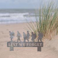 Walking Soldiers "Lest We Forget" Memorial Ground Spike in Natural Steel Finish in Situ Walking Soldiers "Lest We Forget" Memorial Ground Spike in Natural Steel Finish in Situ
