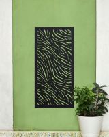 "Black Zebra Print Garden Wall Art" on a green wall next to house plant "Black Zebra Print Garden Wall Art" on a green wall next to house plant