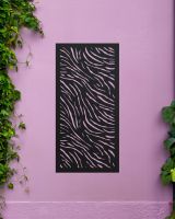 Chic "Black Zebra Print Garden Wall Art" mounted on a purple garden wall Chic "Black Zebra Print Garden Wall Art" mounted on a purple garden wall