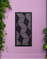 Black "Geometric Cube Wall Art" on a purple garden wall Black "Geometric Cube Wall Art" on a purple garden wall