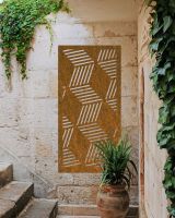 Rustic "Geometric Cube Wall Art" mounted on a brick wall next to stone steps Rustic "Geometric Cube Wall Art" mounted on a brick wall next to stone steps