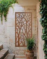 "Rustic Autumnal Trees Garden Wall Art" mounted on a brick wall