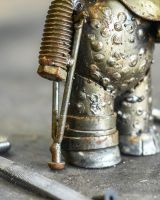 Close up of intricate detail on recycled metal art sculpture