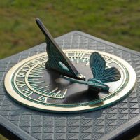 Verdigris Butterfly Sundial in Situ on a Sundial Column