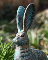 Close Up Of The Face On The Cast Aluminium Sitting Rabbit Sculpture