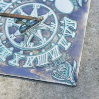 Close-Up of Verdigris "Four Seasons" Sundial - 200mm Close-Up of Verdigris "Four Seasons" Sundial - 200mm