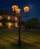 Victorian Triple Headed Lamp Post Set Illuminated at Night