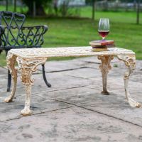 Victorian Rustic Cream Cast Iron Garden Coffee Table in Use in the Garden