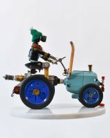 Vintage Farmer Recycled Metal Sculpture side view Vintage Farmer Recycled Metal Sculpture side view