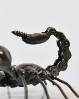 Close up of tail detail on scrap metal art sculpture