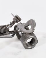 Close up of intricate tractor details on scrap metal art sculpture