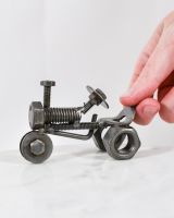 Scale image of tractor scrap metal art sculpture