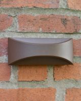 In situ picture of unlit modern garden wall light