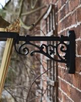 Close up of mounting bracket for wall mounted lantern