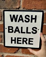 Cast iron wash balls here wall sign