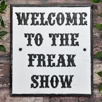 "Welcome To The Freak Show" Cast Iron Sign in Use Outdoors "Welcome To The Freak Show" Cast Iron Sign in Use Outdoors