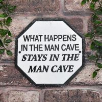 "What Happens In The Man Cave Stays In The Man Cave" Cast Iron Sign in Use Outdoors