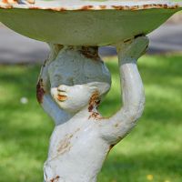 Close-up of the Cream Cherub Design on the Bird Bath Close-up of the Cream Cherub Design on the Bird Bath