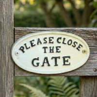 White Iron Please Close The Gate Sign Digital Illustration Close Up
