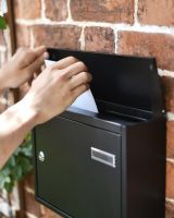 Scale Shot of Posting on Wide Steel Black Wall Mounted Post Box with Lock & Reflector Plate