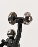 Close up of weight detail on recycled metal art sculpture