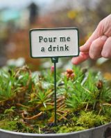 Witty Cast Iron Plant Pot Spike “Pour me a Drink” to scale