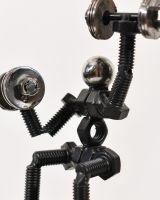 Close up of figure detail on scrap metal art sculpture