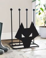 Black steel boot rack with contemporary wolf head silhouette on the front Black steel boot rack with contemporary wolf head silhouette on the front
