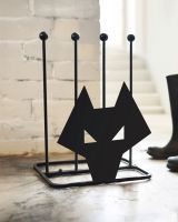 Wolf head boot rack in front of brick wall painted white Wolf head boot rack in front of brick wall painted white