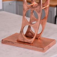 Close up of rectangular base on "Serena" Wine Rack 