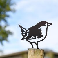 Wren Fence Topper in Use on the Top of a Fence Wren Fence Topper in Use on the Top of a Fence