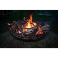 Traditional Kadai Bowl in Use in the Garden Traditional Kadai Bowl in Use in the Garden