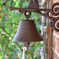 Close up of bell and bracket arm 